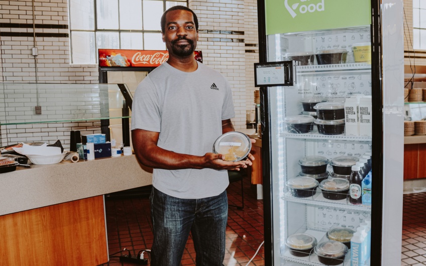 Kwaku Osei, Founder, Farmacy Foods, Detroit, holding salad