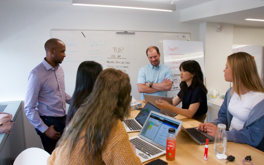 Photo of summer interns with Ross Professor Chris Mueller